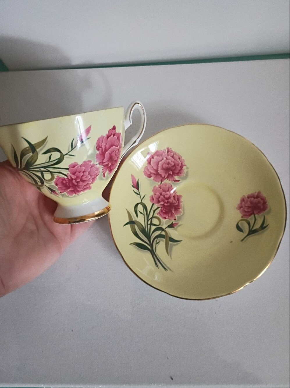Yellow Floral Teacup and Saucer Set with Pink Flower Accents